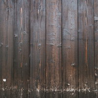 やや擦れた木目の壁のテクスチャーの写真