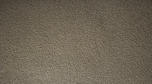 古民家の粗くザラザラした土壁のテクスチャー