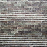 色あせたレンガタイルの壁のテクスチャーの写真