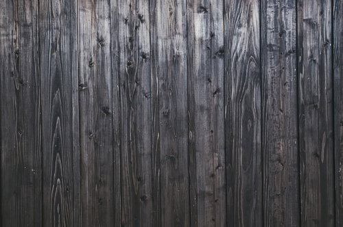 縦に並んだ古い木の板壁のテクスチャー