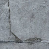 コンクリートの表面に入るヒビ、亀裂のテクスチャーの写真