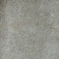 薄くシミのあるコンクリート壁のテクスチャーの写真