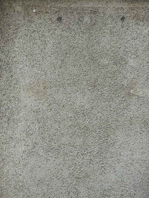 薄くシミのあるコンクリート壁のテクスチャー