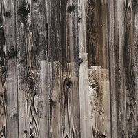 古い木の板のテクスチャー素材 - 経年変化した木目と傷が特徴的な背景の写真