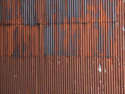 錆びたトタンの壁面のテクスチャー