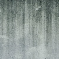 燻んだ模様が浮き出たコンクリートの写真