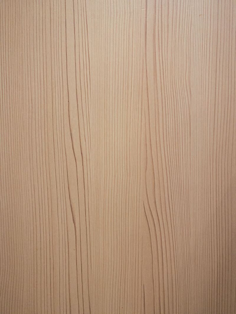A light beige wood texture with a smooth surface and a beautiful wood grain flow