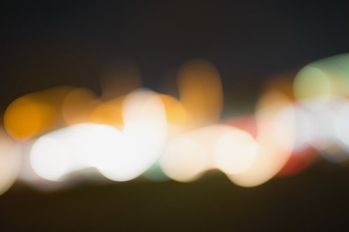 夜のライトアップをぼかした光の背景
