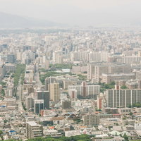 福岡空港から飛び立つ際に見える福岡市街の風景の写真