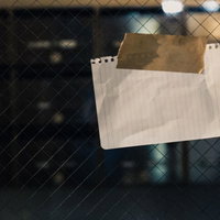 マンションの入口に貼られていた怪文書の写真