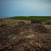 荒地に残る陸軍第109師団歩兵第145聯隊第3大隊トーチカの遺構の写真