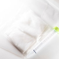 コロナウイルスの感染疑いで受け取ったPCR検査キットと説明書の写真