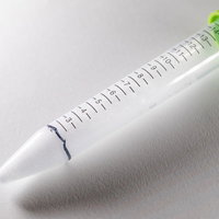 PCR検査の容器内が泡立つ様子、唾液採取検査キットの検体採取状態の写真