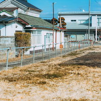 福島県小高地区の住宅街と空き地の風景の写真