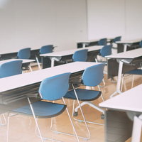 産業交流センターの会議室でセミナーが開催される様子の写真