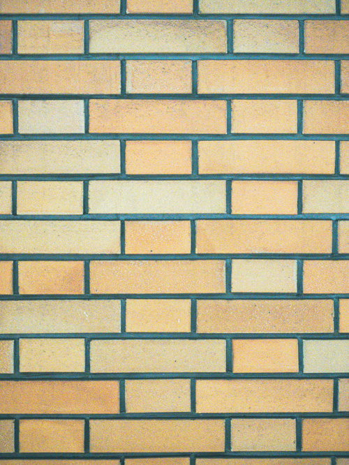 オレンジ系のレンガ調タイル壁テクスチャ