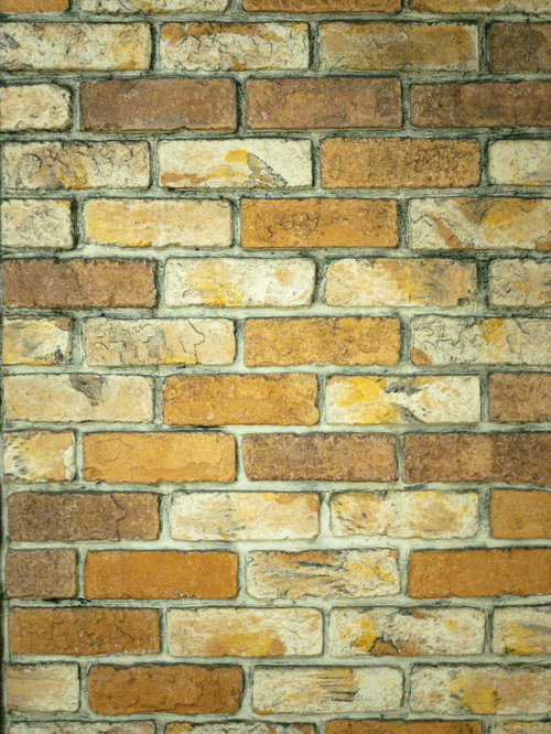 色合いが異なるレンガを積み重ねた壁のテクスチャ