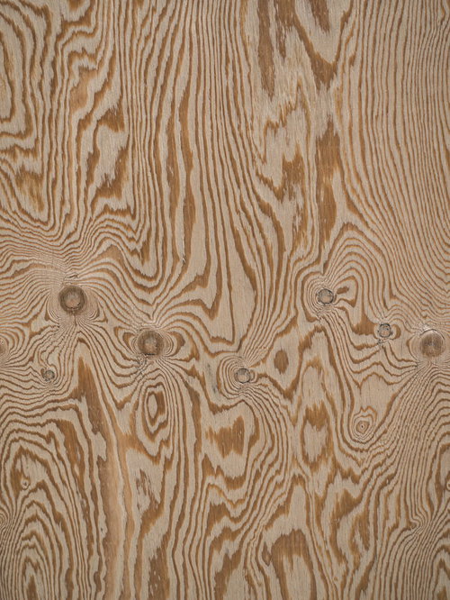 縦に流れる木目模様と節が入った木の板のテクスチャ