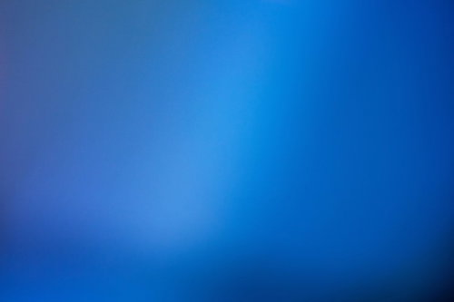 青白い光のグラデーション背景