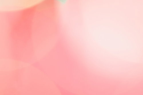 桃色の玉ボケとグラデーション背景