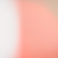 紅白のネオングラデーション背景 ぼけた光の幻想的な照明の写真