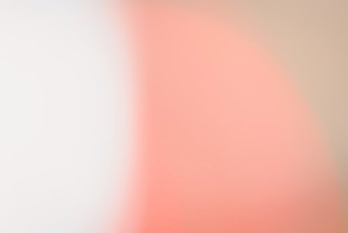 紅白のネオングラデーション背景 ぼけた光の幻想的な照明