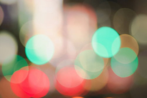 クリスマスカラーのキラキラ玉ボケ背景