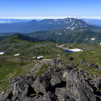 トムラウシ山から見る大雪山南部の山々の展望の写真
