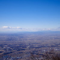 筑波山山頂から見る赤城山方面と関東平野の街並みの写真