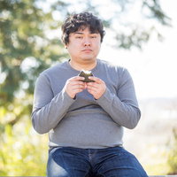 今日の食事制限、メタボ男子がおにぎりを食べるの写真