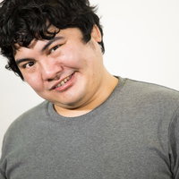 ククク...奴は四天王の中でも最弱...と悪巧みを企む男性の写真