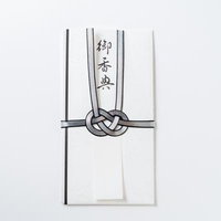 御香典と表書きされた黒白の水引で結ばれた白い不祝儀袋の写真