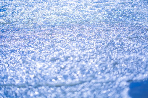 海面に反射する光がきらめく風景 - 夏の海の玉ボケ