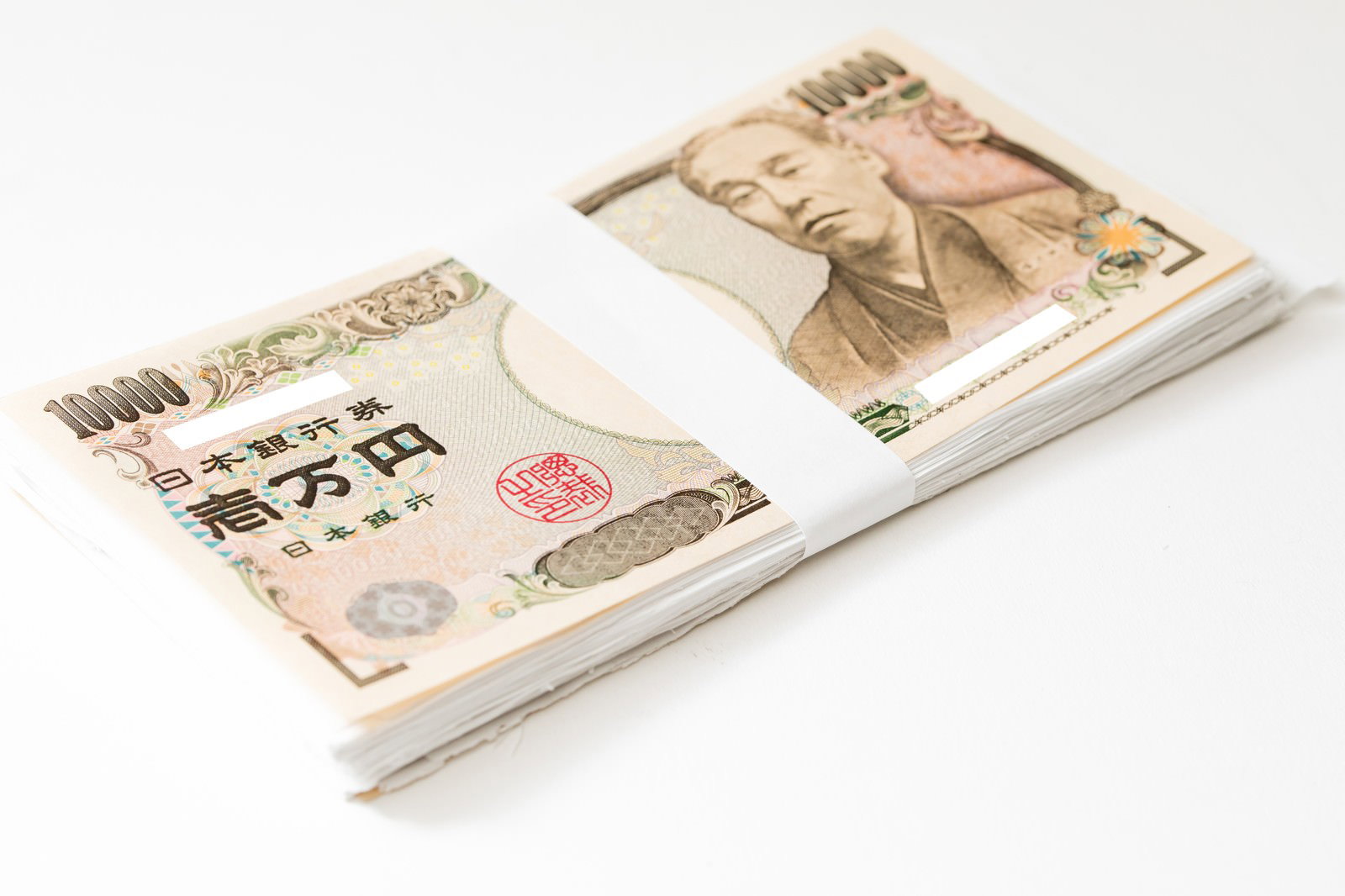 帯封つき1万円札束2つ