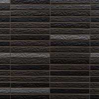 黒とグレーの濃淡があるレンガ調外壁の写真