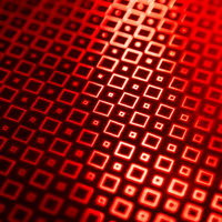 赤い光の幾何学パターンの写真