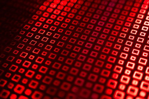 赤いホログラム格子パターンの立体効果デザイン