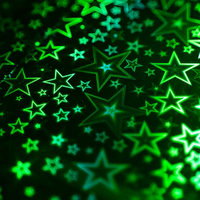 緑色に光る星型パターンのホログラフィック背景の写真