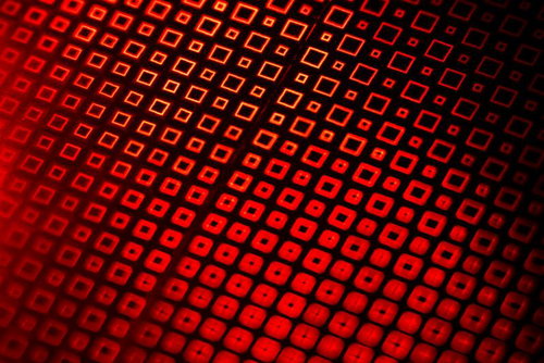 赤いホログラム効果の正方形パターン