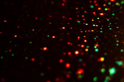 パーティーシーンで使える赤緑のキラキラ光背景