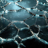 幾何学的模様が広がる割れたガラスと光の抽象美の写真