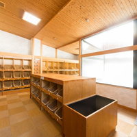 床暖房と敷畳で足元があたたかい岡田旅館の温泉の脱衣場の写真