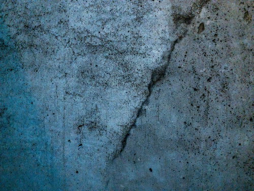 ひび割れした古い建物の壁のテクスチャー