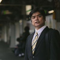 乗車する予定の特急を乗り過ごした上司の写真