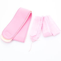 ピンク色の伊達締めと腰紐の着付け小物セットの写真