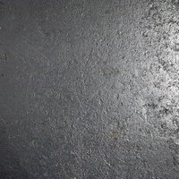 光沢のある灰色に塗装された壁のテクスチャーの写真