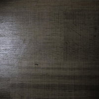 薄汚れた木目のテーブル天板の自然なテクスチャー背景の写真