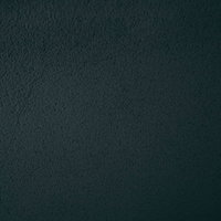 暗闇の中のネイビーカラーの壁テクスチャーの写真