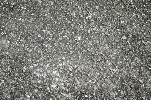 転ぶと痛いタイプのアスファルト、粗い質感のテクスチャー