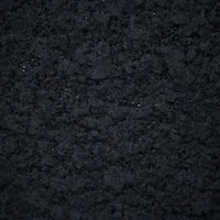 白い細かい粒とアスファルトのテクスチャーの写真